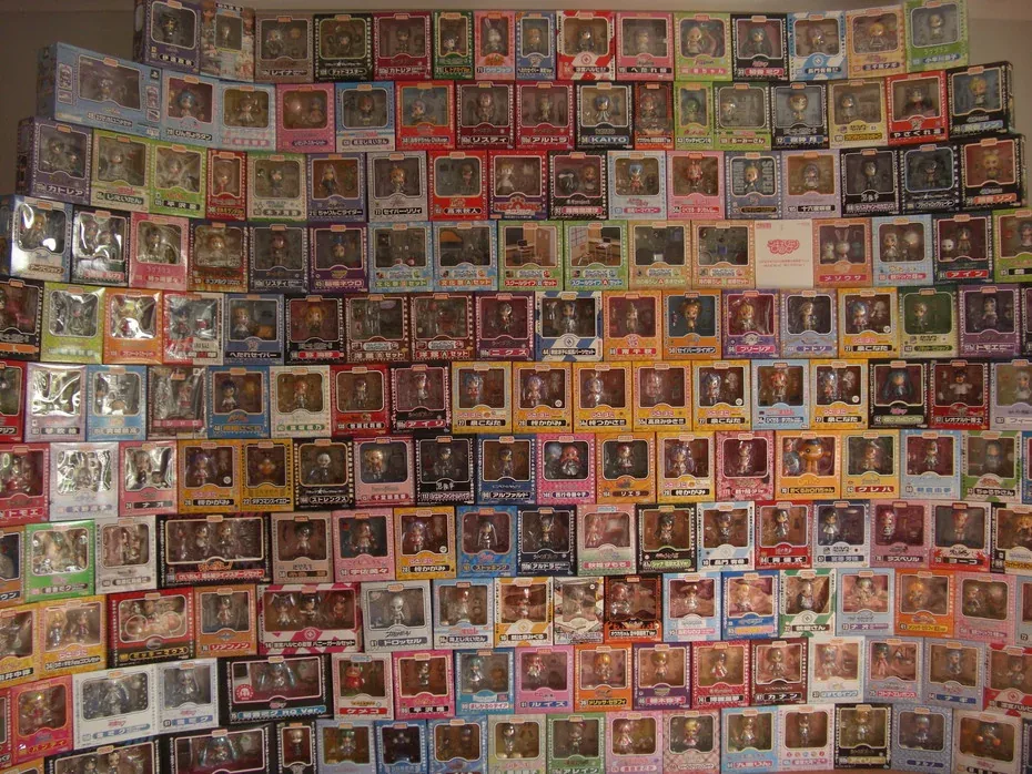 Historical collection of many individually boxed Nendoroids, showing different package artwork and box outlines