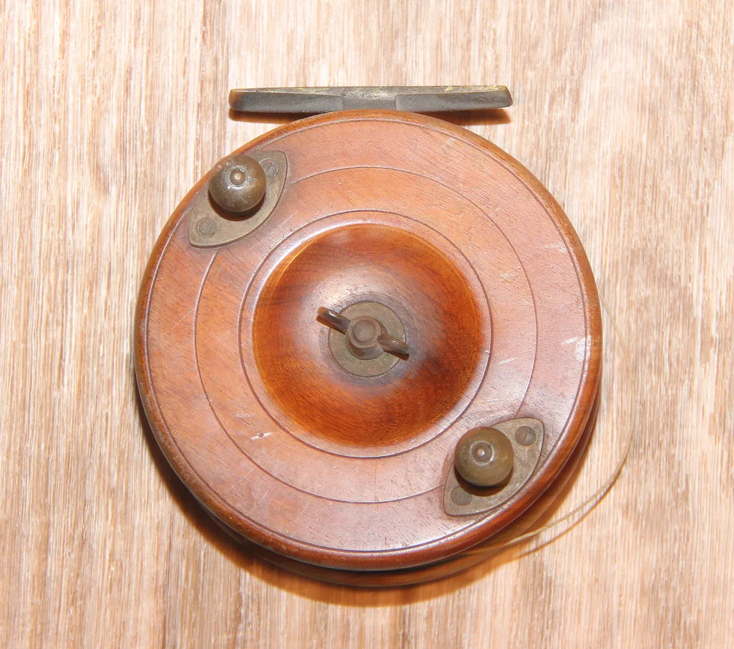 Fishing Reel Display Cases: Open Holders and Covered Collections