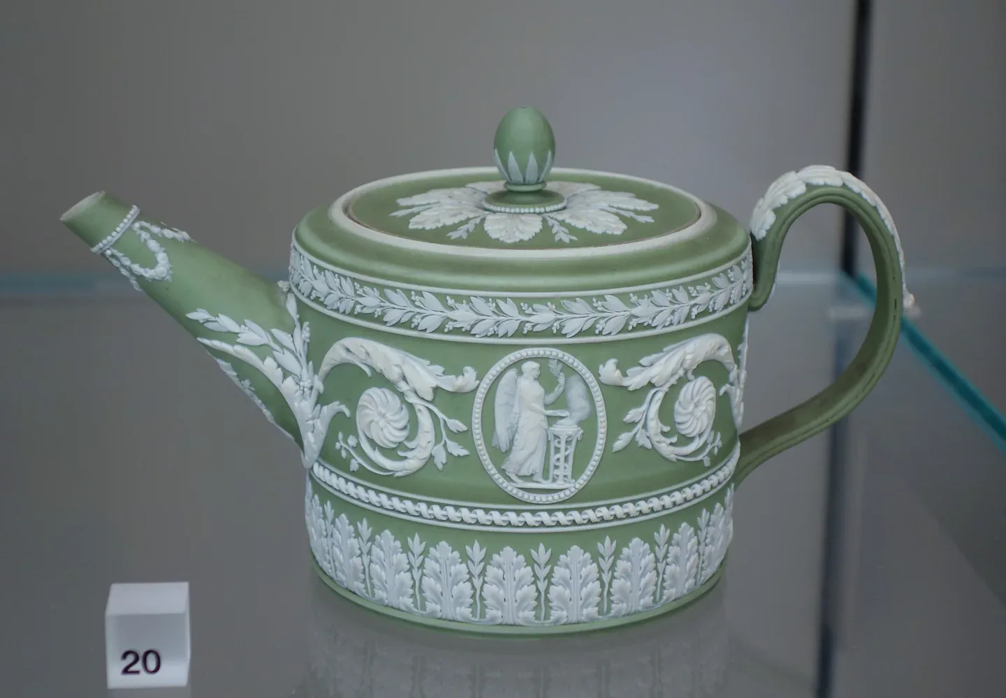 Teapot Display Cases: Spouts, Lids and Curved Shelf Openings